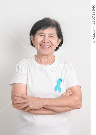 Elderly with blue Ribbon for concept of blue November, November Prostate Cancer Awareness month, World Diabetes day , Men Health month, International men, Father day. Healthcare and world cancer day Elderly with blue Ribbon for concept of blue November, November Prostate Cancer Awareness month, World Diabetes day , Men Health month, International men, Father day. Healthcare and world cancer day 130718640