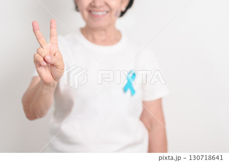 Elderly with blue Ribbon for concept of blue November, November Prostate Cancer Awareness month, World Diabetes day , Men Health month, International men, Father day. Healthcare and world cancer day Elderly with blue Ribbon for concept of blue November, November Prostate Cancer Awareness month, World Diabetes day , Men Health month, International men, Father day. Healthcare and world cancer day 130718641
