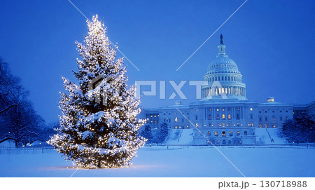 Snow Covered Capitol Building with Brightly Lit Christmas Tree at Night 130718988