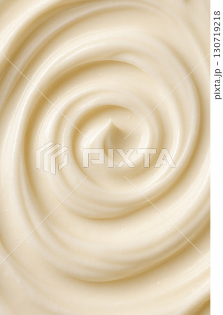 Smooth swirl of creamy texture with glossy highlights macro shot of dairy inspired surface minimal abstract background ultra detailed 130719218