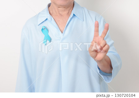 Elderly with blue Ribbon for concept of blue November, November Prostate Cancer Awareness month, World Diabetes day , Men Health month, International men, Father day. Healthcare and world cancer day 130720104
