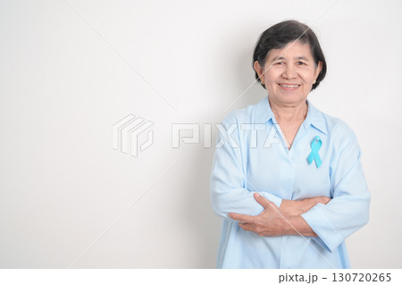 Elderly with blue Ribbon for concept of blue November, November Prostate Cancer Awareness month, World Diabetes day , Men Health month, International men, Father day. Healthcare and world cancer day 130720265