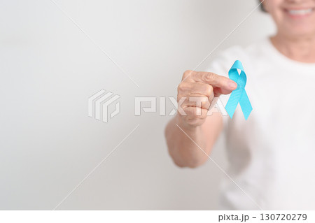 Elderly with blue Ribbon for concept of blue November, November Prostate Cancer Awareness month, World Diabetes day , Men Health month, International men, Father day. Healthcare and world cancer day Elderly with blue Ribbon for concept of blue November, November Prostate Cancer Awareness month, World Diabetes day , Men Health month, International men, Father day. Healthcare and world cancer day 130720279