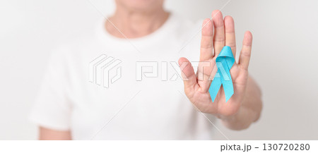 Elderly with blue Ribbon for concept of blue November, November Prostate Cancer Awareness month, World Diabetes day , Men Health month, International men, Father day. Healthcare and world cancer day Elderly with blue Ribbon for concept of blue November, November Prostate Cancer Awareness month, World Diabetes day , Men Health month, International men, Father day. Healthcare and world cancer day 130720280