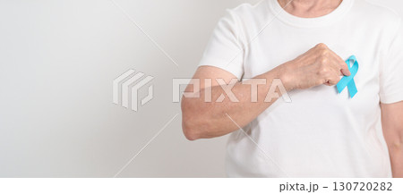 Elderly with blue Ribbon for concept of blue November, November Prostate Cancer Awareness month, World Diabetes day , Men Health month, International men, Father day. Healthcare and world cancer day 130720282