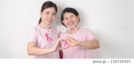 Couple woman with pink Ribbon for Pink October Breast Cancer Awareness month, May Women Health, November Birth Parents Adoption, women rights, Empowerment, March International Women day and Cancer day Couple woman with pink Ribbon for Pink October Breast Cancer Awareness month, May Women Health, November Birth Parents Adoption, women rights, Empowerment, March International Women day and Cancer day 130720397