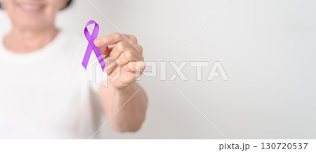Elderly with Purple Ribbon for Violence, Pancreatic, Esophageal, Testicular cancer, Alzheimer, Epilepsy, Lupus, Crohn, Thyroid, Sarcoidosis and Fibromyalgia. Awareness month and World cancer day Elderly with Purple Ribbon for Violence, Pancreatic, Esophageal, Testicular cancer, Alzheimer, Epilepsy, Lupus, Crohn, Thyroid, Sarcoidosis and Fibromyalgia. Awareness month and World cancer day 130720537