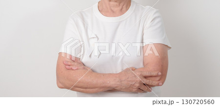 Elderly with White ribbon for concept November Lung Cancer Awareness month, Stop Violence Against Women, Adoption, May Retinoblastoma, Action for Women Health, March Remembrance, October Osteoporosis 130720560