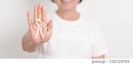 Elderly woman with Peach Ribbon for September Uterine Cancer Awareness month, Endometrial Cancer, Gynecologic, Uterus and Ovaries, Endometriosis, June Vaginal cancer and World cancer day concept Elderly woman with Peach Ribbon for September Uterine Cancer Awareness month, Endometrial Cancer, Gynecologic, Uterus and Ovaries, Endometriosis, June Vaginal cancer and World cancer day concept 130720785