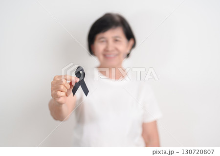 Elderly with Black ribbon for May Melanoma and skin cancer Awareness month, October Vaccine injury awareness month, Mourning Remembrance, March Sleep awareness week, Gang Prevention and Anti Violence Elderly with Black ribbon for May Melanoma and skin cancer Awareness month, October Vaccine injury awareness month, Mourning Remembrance, March Sleep awareness week, Gang Prevention and Anti Violence 130720807