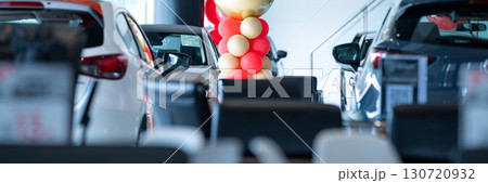 Car parked in luxury showroom. Car dealership office. Car showroom business. New car parked in modern showroom. Auto for sale and rent business. Automobile leasing and insurance. Electric automobile. Car parked in luxury showroom. Car dealership office. Car showroom business. New car parked in modern showroom. Auto for sale and rent business. Automobile leasing and insurance. Electric automobile. 130720932