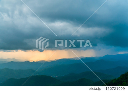 Landscape of Morning Mist with Mountain Layer. mountain ridge and clouds in rural jungle bush forest Landscape of Morning Mist with Mountain Layer. mountain ridge and clouds in rural jungle bush forest 130721009