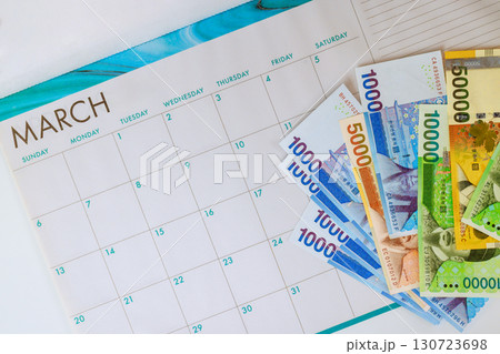 March calendar South Korean won banknotes suggest strategies for budgeting saving this month. March calendar South Korean won banknotes suggest strategies for budgeting saving this month. 130723698