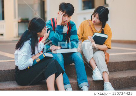 Fellow students are consoling friends who are disappointed in grades, frustrated with tasks that are not meeting their goals, helping each other. Fellow students are consoling friends who are disappointed in grades, frustrated with tasks that are not meeting their goals, helping each other. 130724423