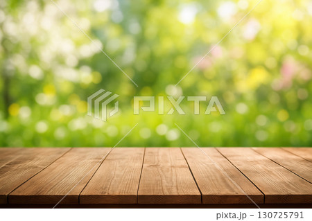 Wooden table blurred background spring garden copy space sunlight outdoor nature empty bright. Wooden table with blurred spring garden background sunlight and copy space creating bright and fresh 130725791