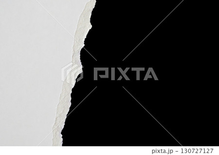 White ripped paper torn edges strips isolated on black background 130727127