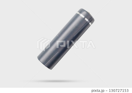AA alkaline battery flying on gray background AA alkaline battery flying on gray background 130727153