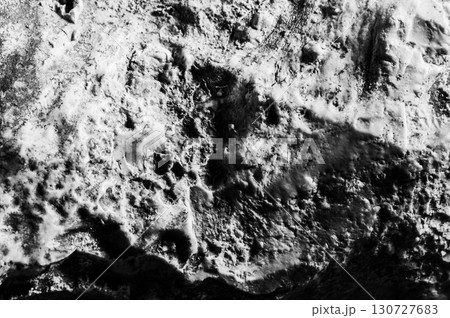 The stone surface is filled with mineral inclusions 130727683