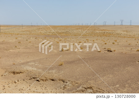 Vast desert landscape with power lines in the remote Jowzjan Province of northern Afghanistan 130728000