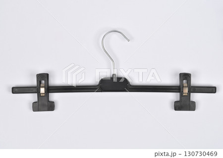 Plastic hanger with two clips Plastic hanger with two clips 130730469