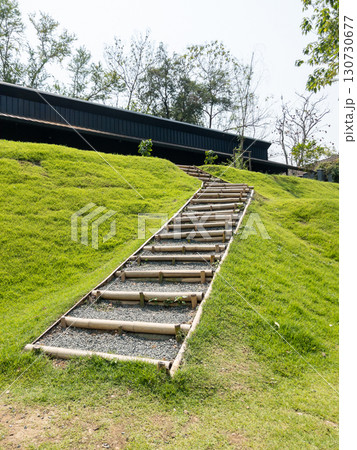 Eco Bamboo Steps on Cafe Hillside. Eco Bamboo Steps on Cafe Hillside. 130730677