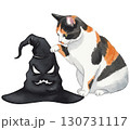 A Calico cat is poking the demon witch hat 130731117