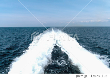 Water trail behind cruise ship. Summer travel concept. 130731126