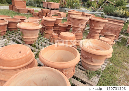 Terracotta pots in shop of Europe, Italy. Gardening and hobby. Nature and plants. Terracotta pots in shop of Europe, Italy. Gardening and hobby. Nature and plants. 130731398