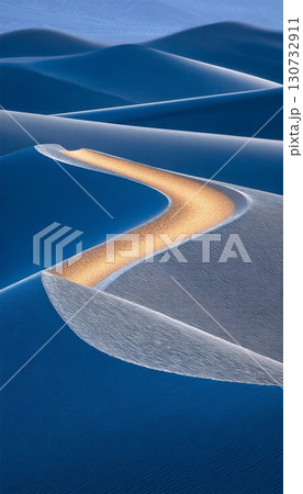 A Serene Desert Landscape Featuring Majestic Shifting Sand Dunes Under A Dreamy Sunset Sky 130732911