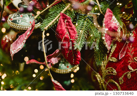 A Christmas tree with red and green ornaments 130733640