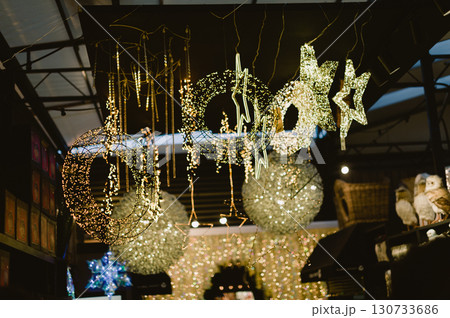A Christmas tree with lights and a star on top. Christmas 130733686