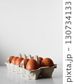 A carton of eggs with a white background 130734133