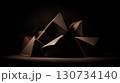 Close up of a pile of chocolate shaped like triangles. Concept of indulgence and luxury 130734140