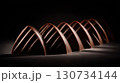 Row of chocolate truffles with a dark brown color, appear to be very close together 130734144