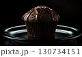 Chocolate cupcake with chocolate frosting on top 130734151