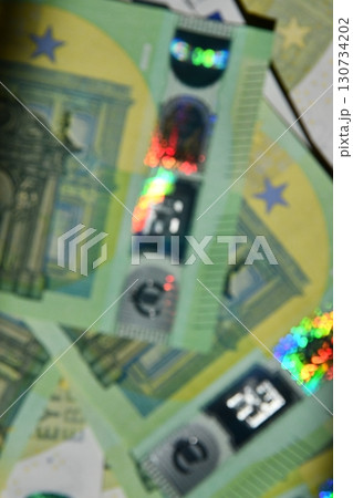 Euro currency with holographic elements blurry background showcasing intricate design patterns 130734202