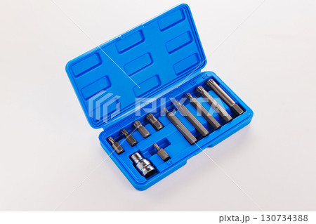 A set of single-sided chrome steel bits in a blue plastic box  130734388