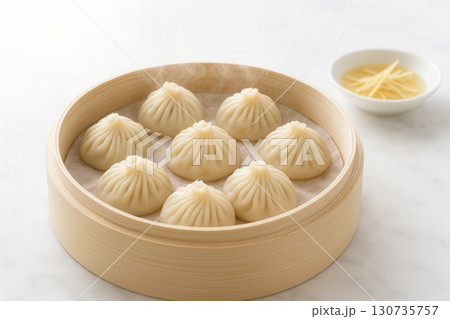 Xiaolongbao Soup Dumplings In Bamboo Steamer With Ginger Vinegar 130735757