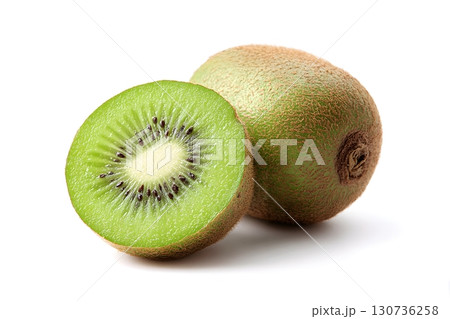 A whole kiwi fruit and a fresh sliced kiwi half are displayed on an isolated white background. 130736258