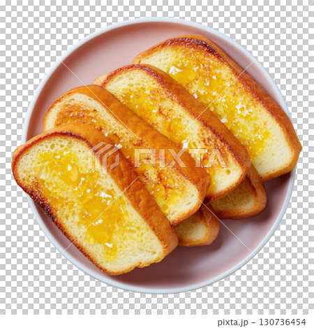 Delicious Slices of Golden Brown French Toast Topped with Butter and Sweet Maple Syrup on a Pink Plate 130736454