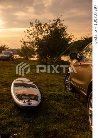 Lakeside Adventure with SUV and Paddleboard 130737897