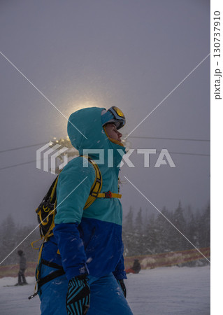 Person in Winter Gear Near Ski Lift Person in Winter Gear Near Ski Lift 130737910