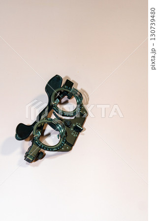 an optical device for examining vision a pink surface 130739480