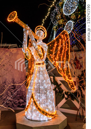 Illuminated Angel. Christmas decoration in city park Illuminated Angel. Christmas decoration in city park 130741590