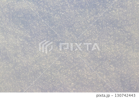 Texture of the white snow. Winter background 130742443