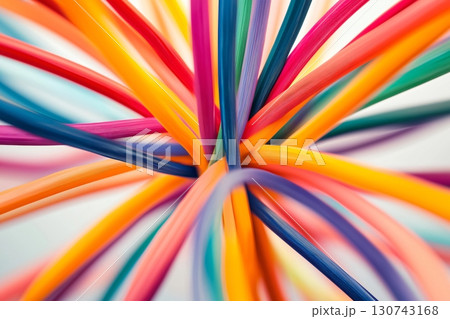 Multiple colorful cables intertwined creating a network hub on a white background Multiple colorful cables intertwined creating a network hub on a white background 130743168