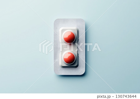 Vibrant image of red pills on blue background, perfect for medical concepts 130743644