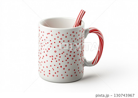 Christmas mug with red and white candy cane handle standing on white background 130743967