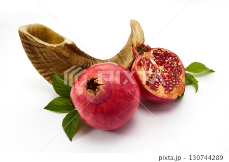 Pomegranate and Shofar. Rosh Hashanah Symbols. Jewish New Year celebration. Pomegranate and Shofar. Rosh Hashanah Symbols. Jewish New Year celebration. 130744289