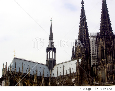 Majestic Cologne Cathedral Reaches for the Sky With Its Stunning Spires and Intricate Roof Design Majestic Cologne Cathedral Reaches for the Sky With Its Stunning Spires and Intricate Roof Design 130746428